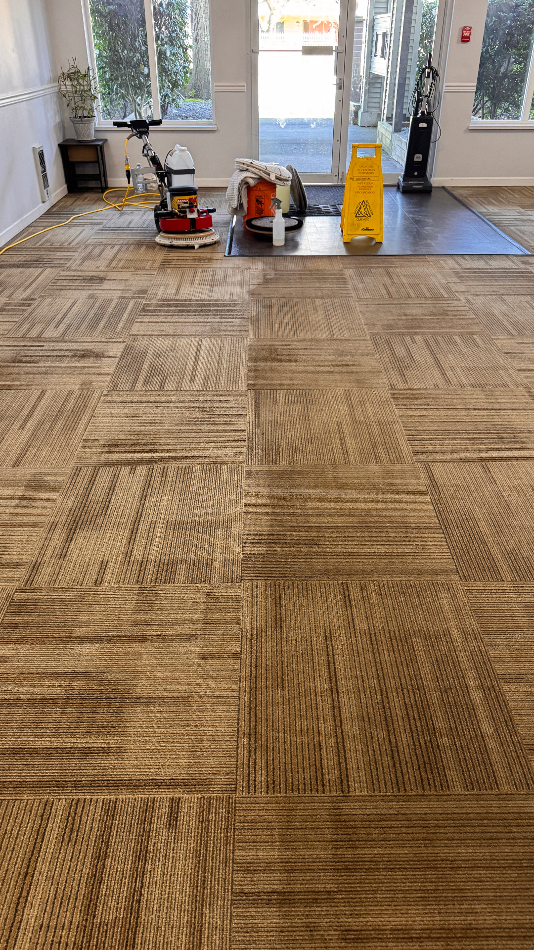 Commercial carpet tile cleaning in progress at a Fraser Valley strata building